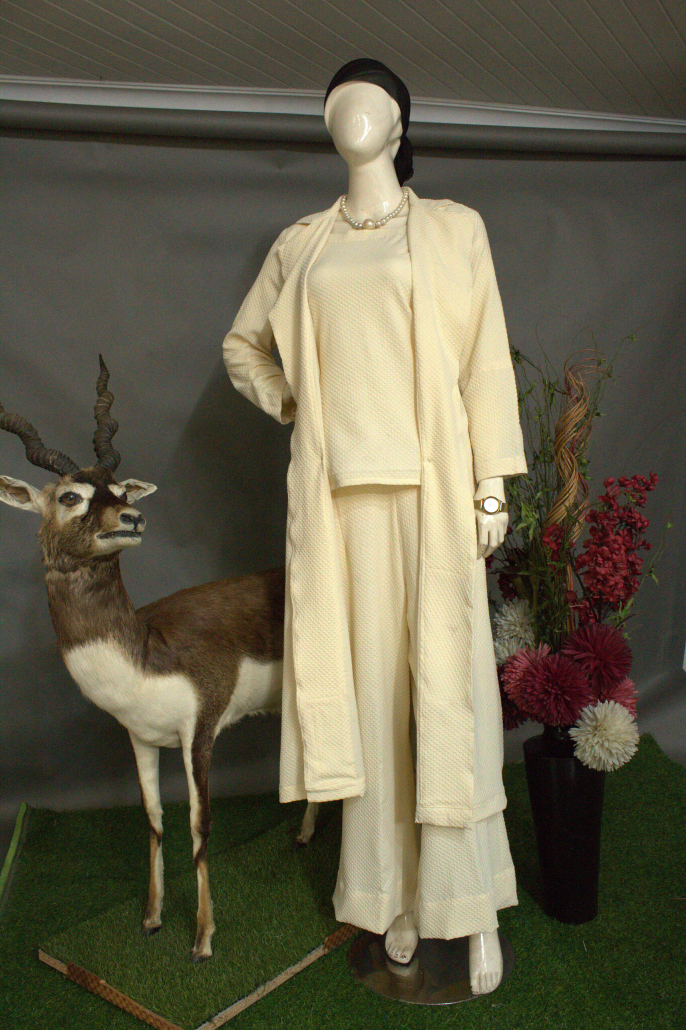 Elegant Cream Fashion Piece & Artistic Taxidermy